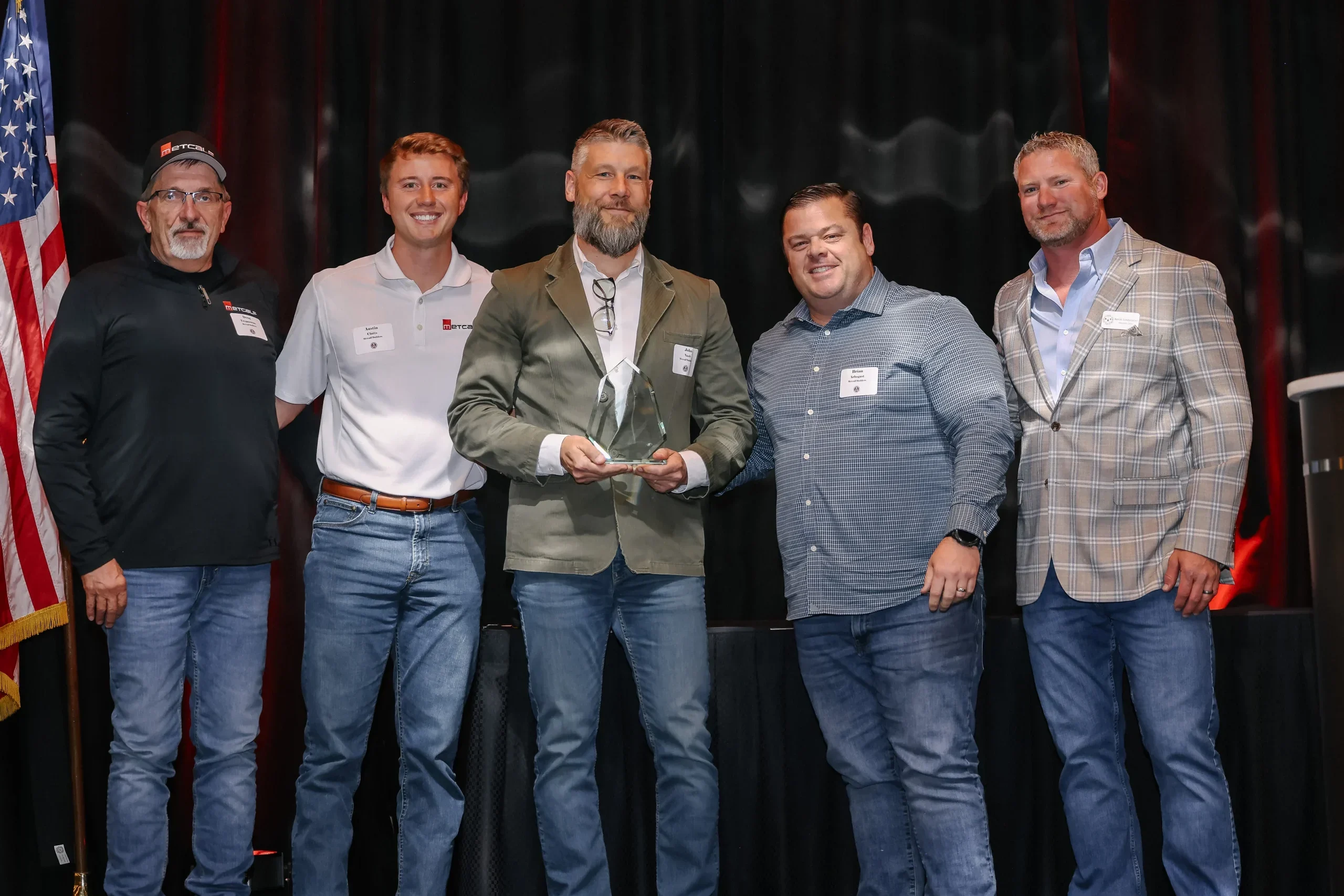 Group Photo of Metcalf Builders winning the award